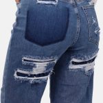 Loose straight jeans met destroyed details blauw