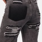 Loose straight jeans met destroyed details grijs